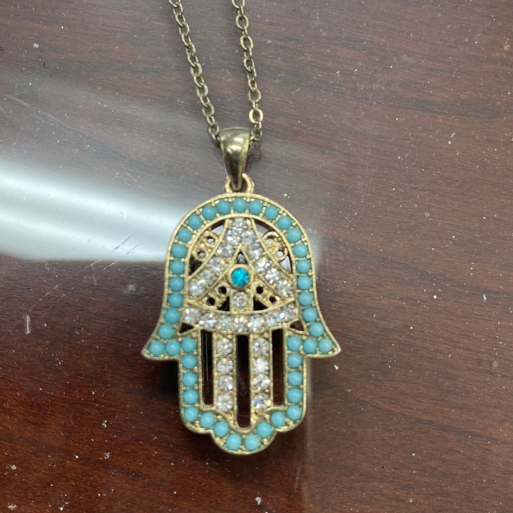 Evil eye/ hamsa necklace.
